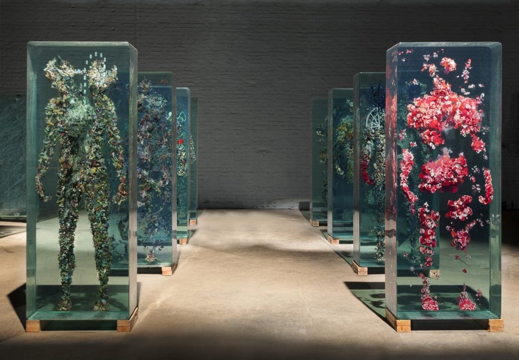 3D Collaged Figures Encased In Glass By Dustin Yellin