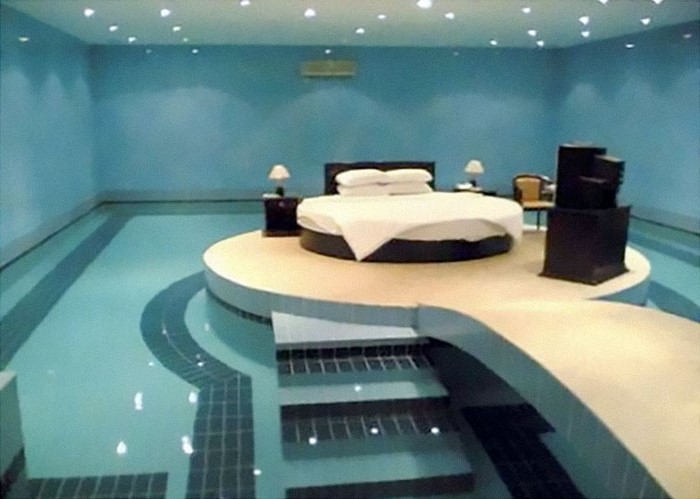 Bed in the middle of a swimming pool  | 10 Bizarre Beds You'd Never Be Able To Sleep In | Brain Berries